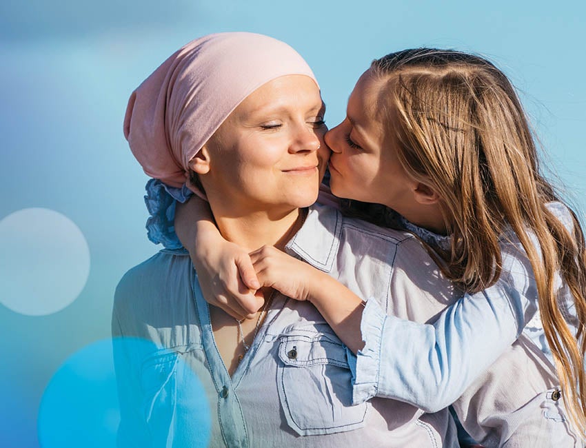 Woman and daughter hugging