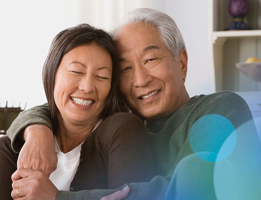 Man and woman smiling at the camera