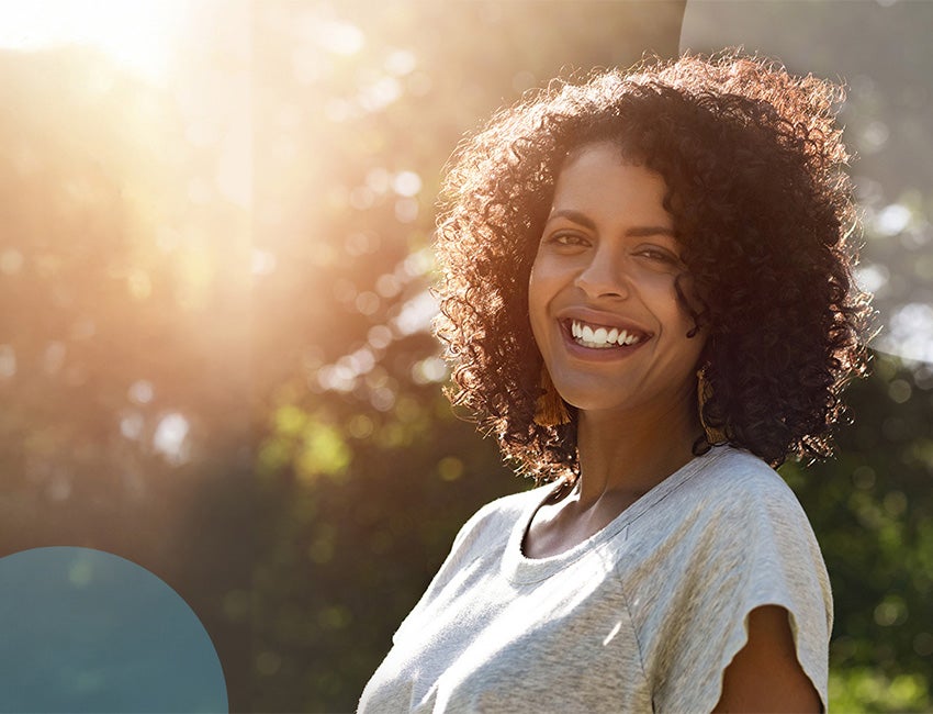 A happy woman Smiling at the camera